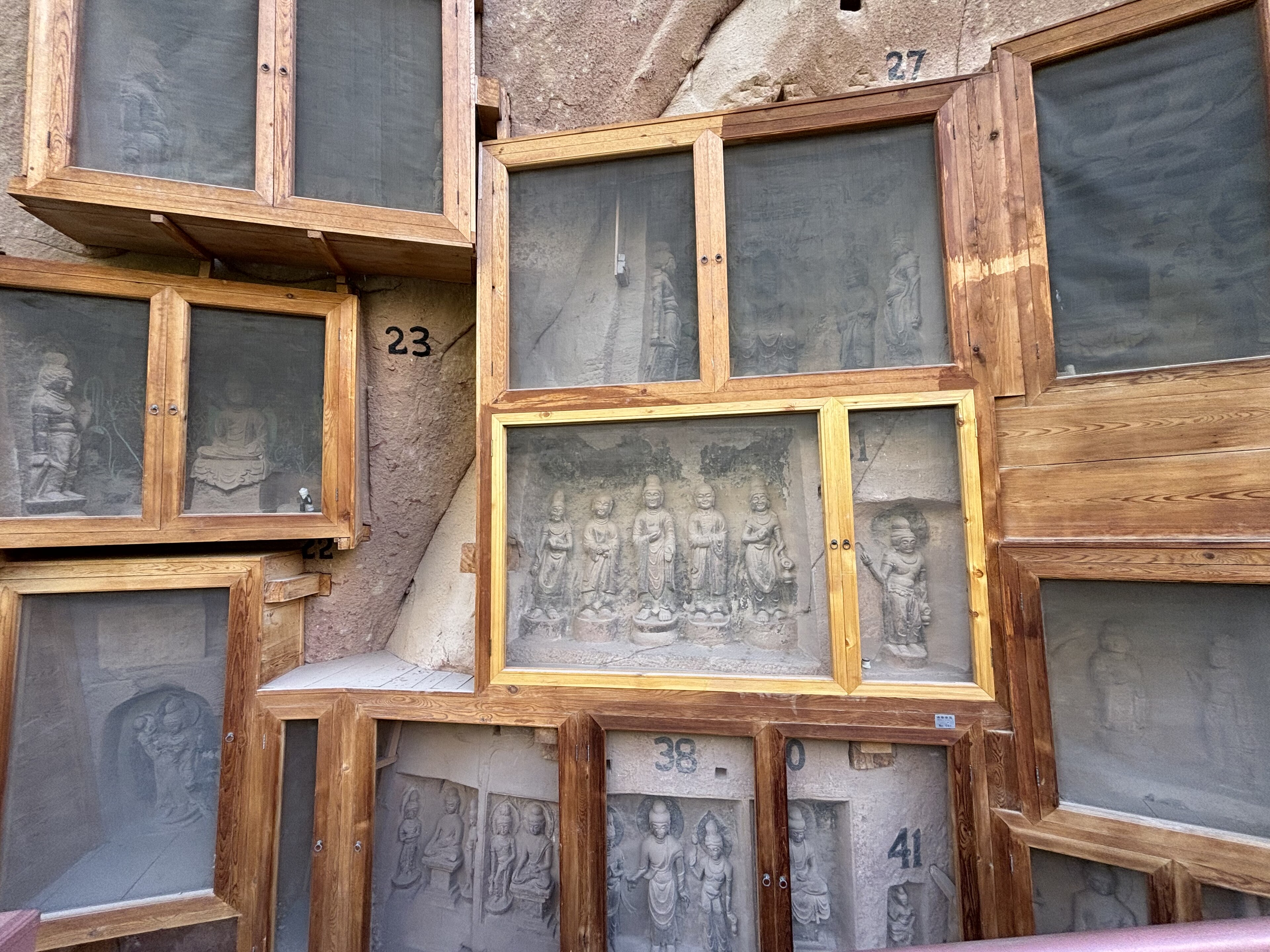 Carved niches on the sandstone cliff at Bingling Temple